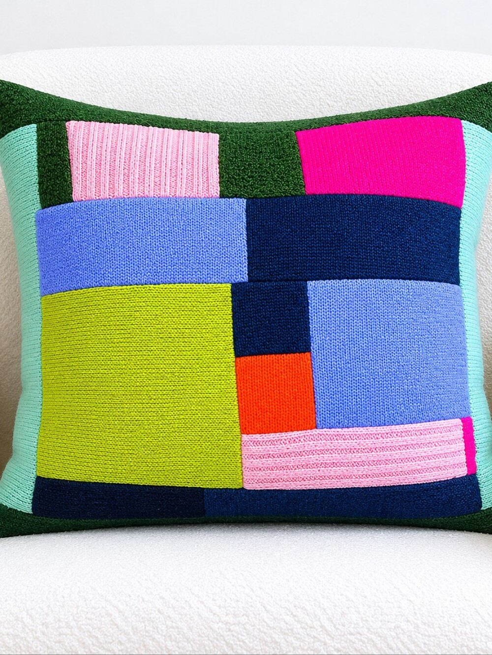 The Elder Statesman Patchwork Cashmere Pillow.
